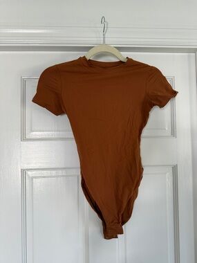 SKIMS Burnt Orange Short Sleeve Bodysuit